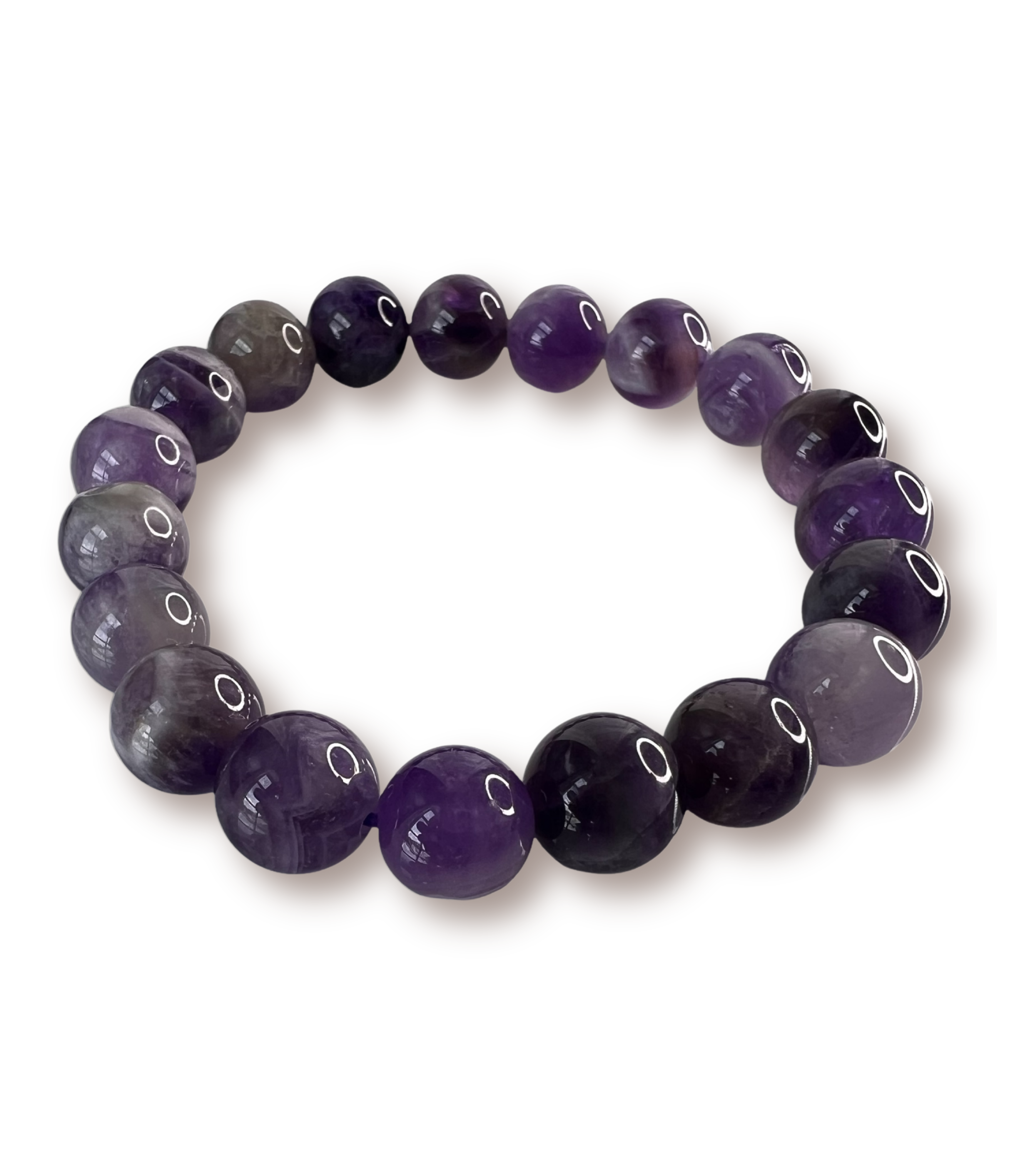 A beaded stretch amethyst crystal bracelet made of polished oval gemstone beads in shades of purple, violet, and dark amethyst, arranged in a circle on a white background.