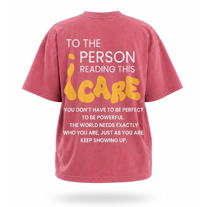 Back of Sunset Brick Red tee reading "To The Person Reading This I Care" in white and gold, with the affirmation "you don&