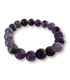 A beaded stretch amethyst crystal bracelet made of polished oval gemstone beads in shades of purple, violet, and dark amethyst, arranged in a circle on a white background.