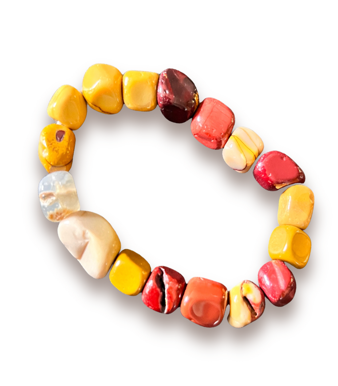Beaded stretch bracelet made of smooth, polished tumbled mookaite stones in yellow, red, orange, and cream