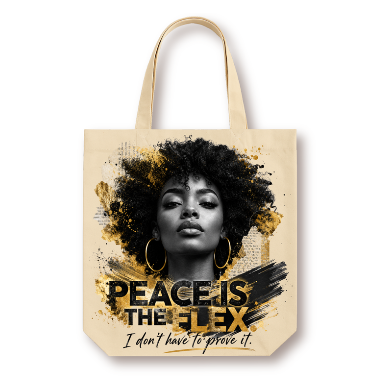 Natural canvas tote featuring a black-and-white portrait of a woman with a curly afro and gold hoop earrings, gold paint splatter accents, and bold text reading "Peace Is The Flex. I don't have to prove it."