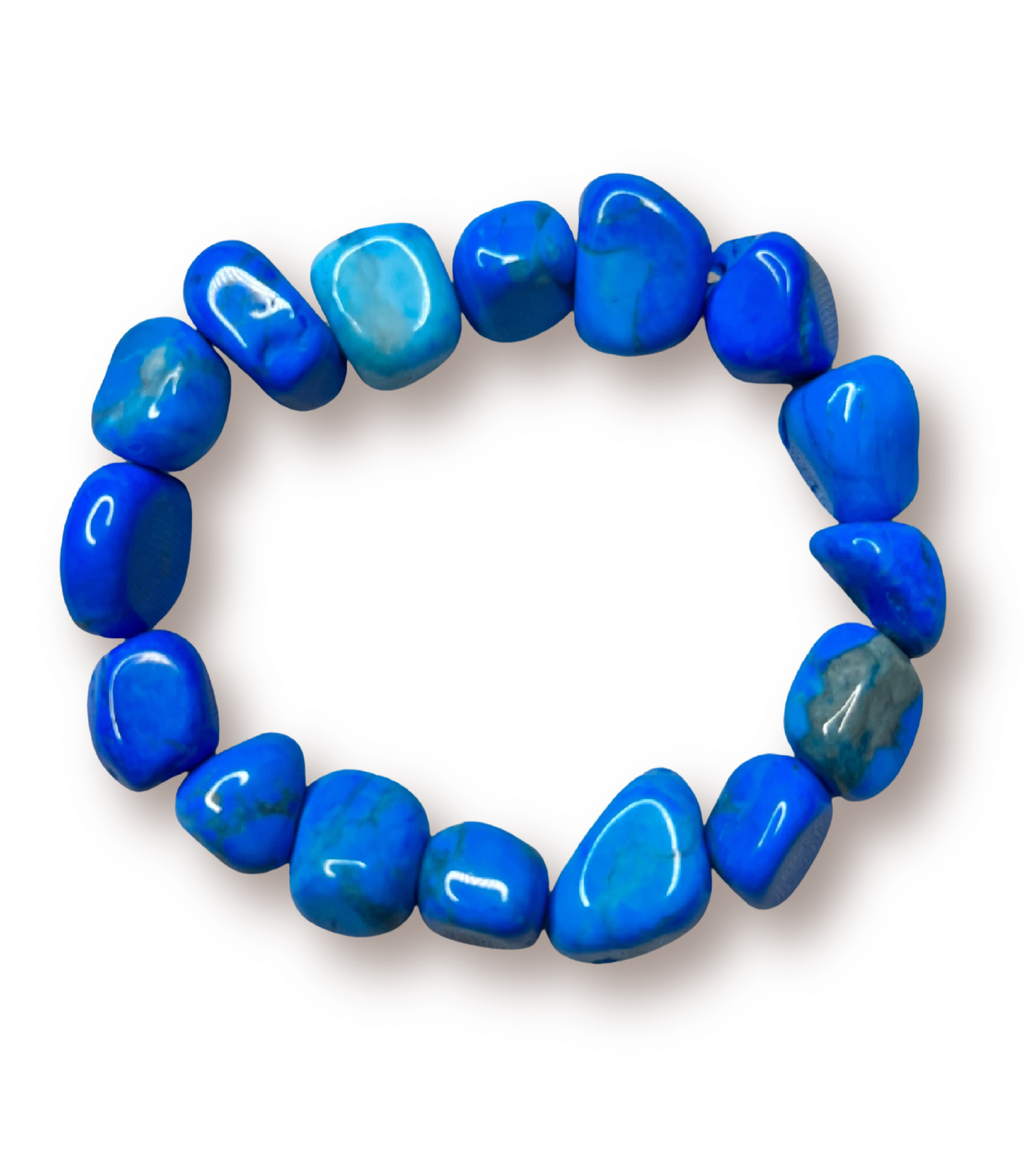Beaded stretch bracelet made of smooth, polished turquoise howlite beads in shades of royal and cornflower blue